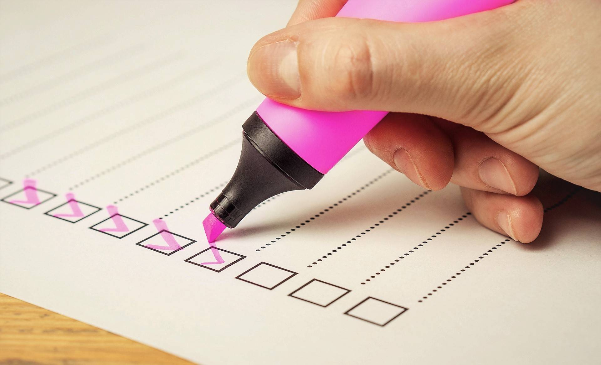 A moving checklist or to-do list being checked off