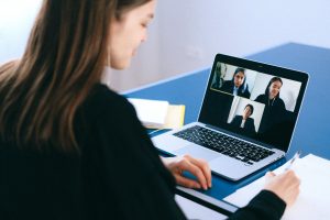 woman on conference call on laptop